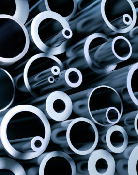 a stack of various metall pipes